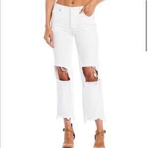 Free People
Maggie Straight Mid Rise Distressed denim jeans